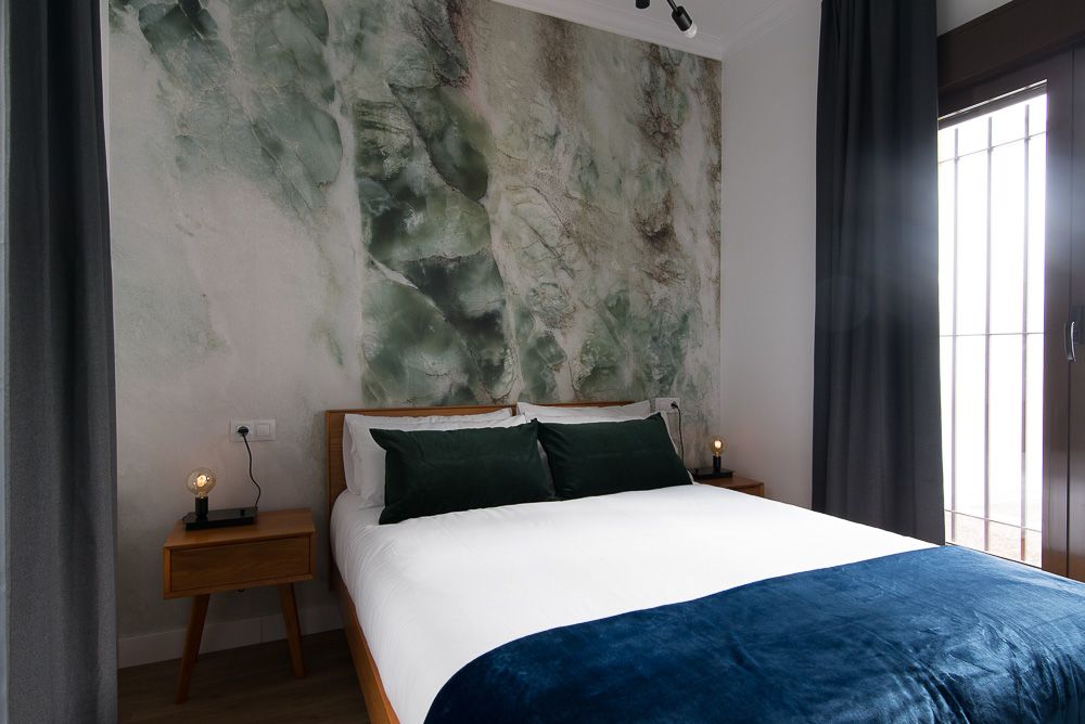 Dormitorio con acceso a patio